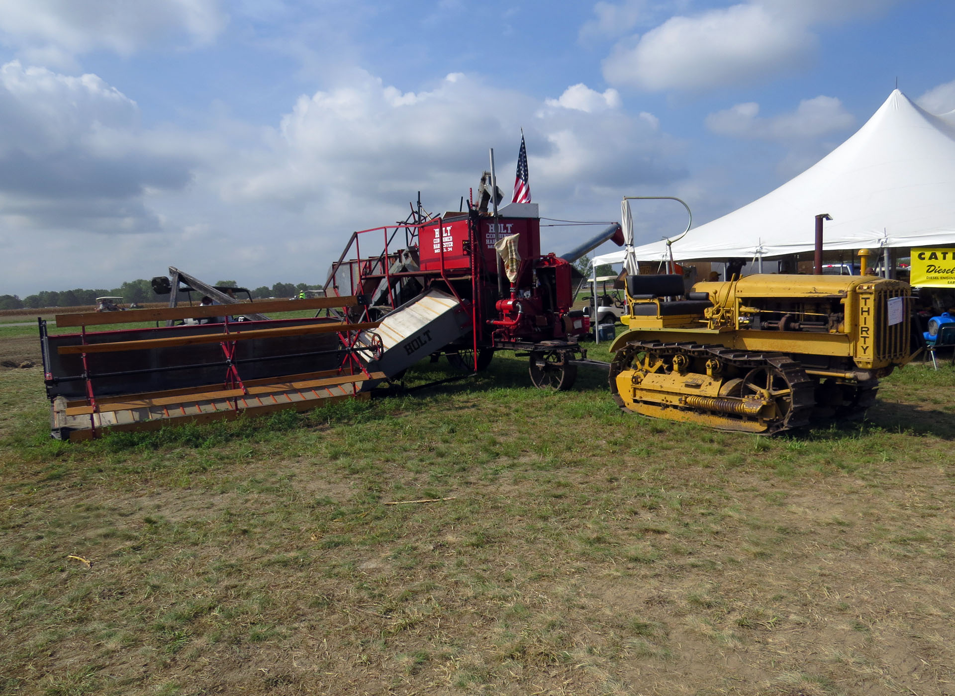 Chuck Ehler’s Holt combine poses behind Jerry Irwin’s cold weather Thirty