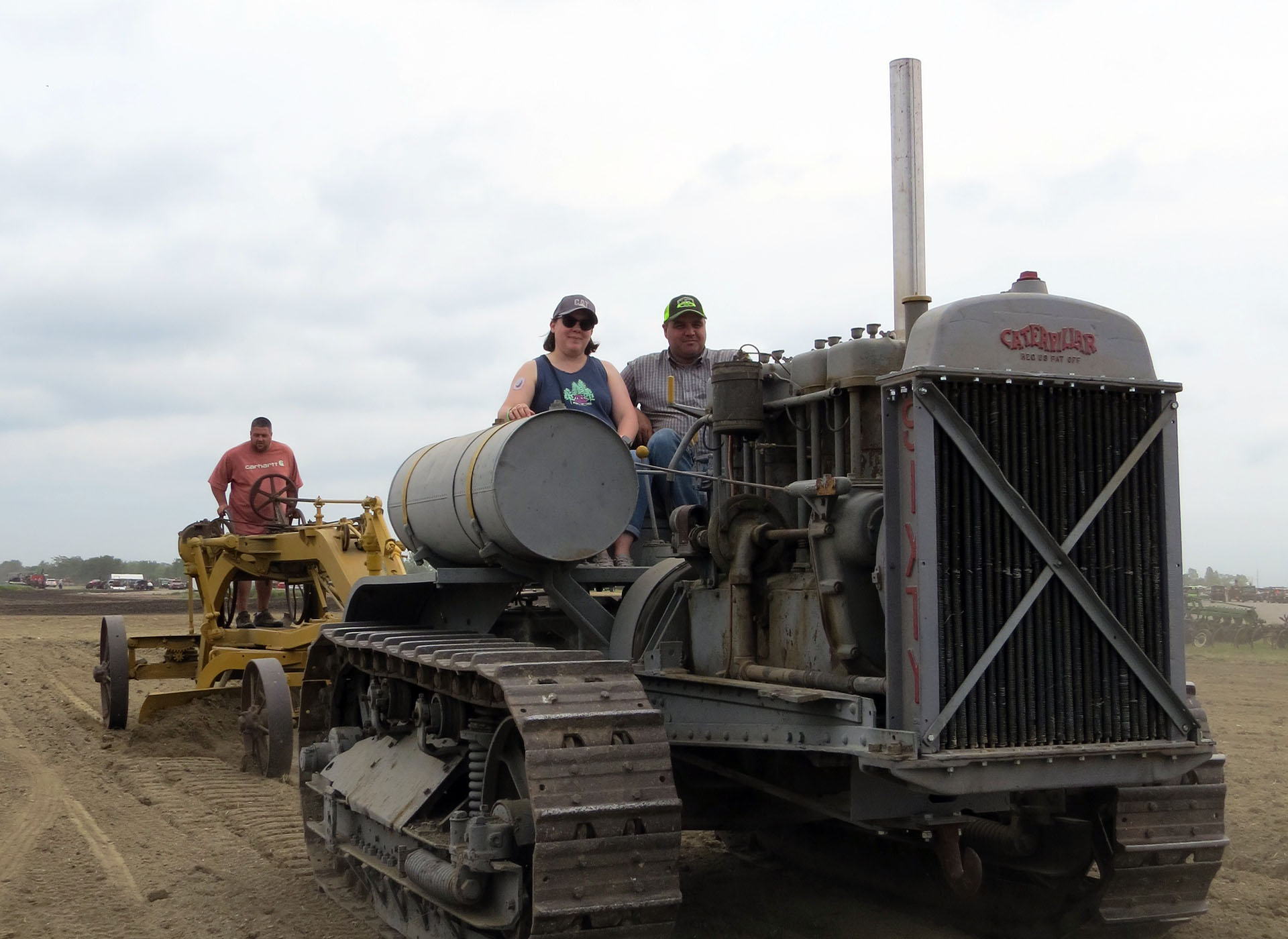 Clayton Smith and Kelli Martin piloting Chuck Ehler’s Gas Sixty with No. 44 grader in tow